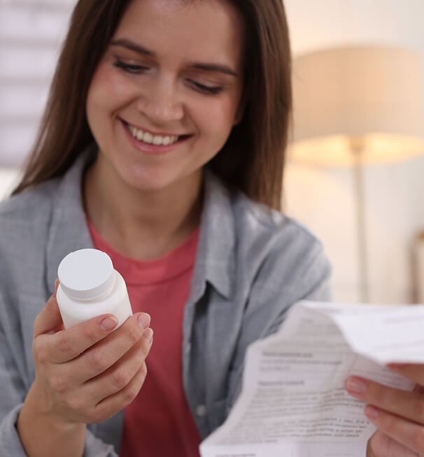 Looking at Medication Bottle and receipt